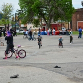 Children of all ages enjoy riding their bicycles through the Clark School parking lot.